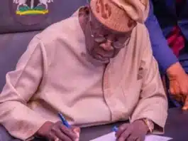 President Tinubu at the Statehouse Abuja, signing the Electoral Act 2026 into law