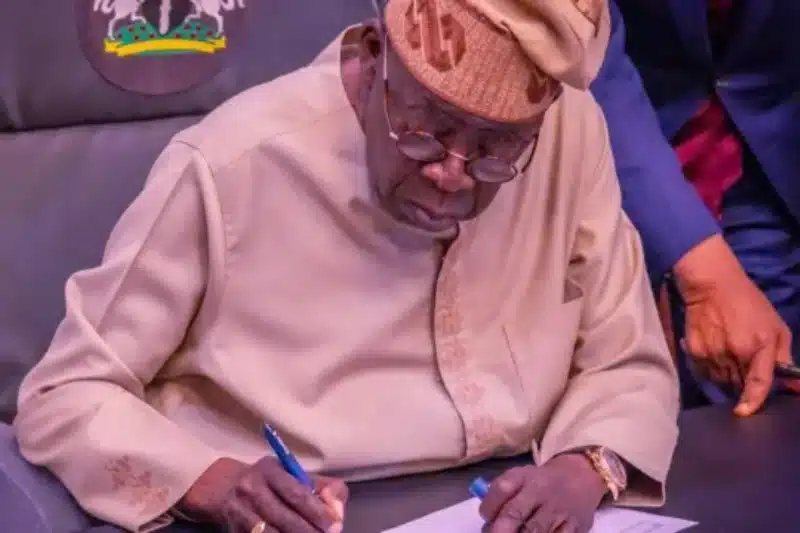 President Tinubu at the Statehouse Abuja, signing the Electoral Act 2026 into law